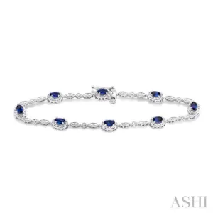 5x3MM Oval Cut Sapphire and 1/20 Ctw Single Cut Diamond Bracelet in 10K White Gold