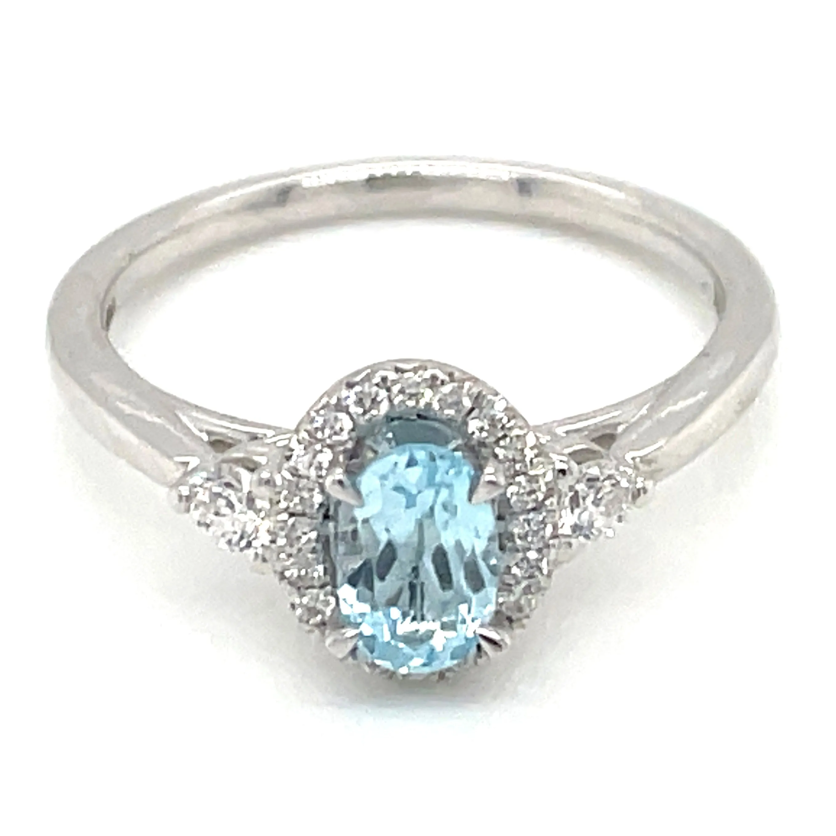 9ct White Gold Earth Grown Oval Sky Blue Topaz & Diamond Halo Ring