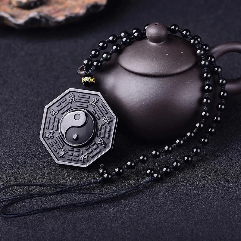 OBSIDIAN YIN AND YANG PENDANT